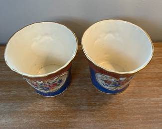 M5 - $45. PAIR Painted Cachepots. Measures 5.75" across x 4.75" tall. They do have some very minor chipping. 
