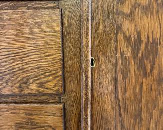 M62 - $225. Antique Oak Chifferobe. Measures 40" wide x 18" deep x 61" tall. Long door has been repaired on the bottom right corner. All drawers slide easily as they should!