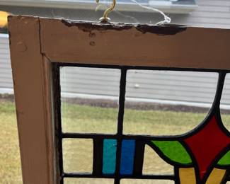M1 - $75. Stained Glass with Hooks to Hang in the Window. Measures 20" x 14.25". One crack in a light blue pane. 