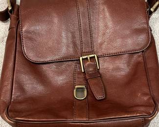M110 - $25. Vintage Fossil Brown Leather Crossbody. Measures 11" x 3.25" x 10". 
