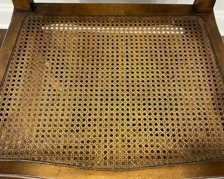 M102 - $125. Single Wingback Armchair. Caning is in good condition - but vintage! Measures 26.5" x 16.5" floor to seat x 50.5" tall. 