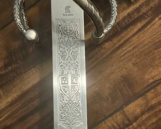 M68 - $60. Decorative Sword. Stamped "Toledo". Measures 41" long. 