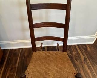 M85 - $40. Small Rocker with woven seat. 
