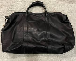 M115 - $140. Vintage COACH Black Leather Duffle Back. Measures 22" x 9" x 18". 