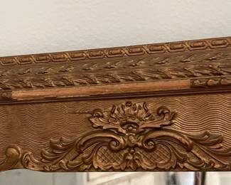 M49 - $30. Antique Framed Wall Mirror. Measures 23" x 27". Currently can only be hung horizontally as photographed. Does have a few missing decorative pieces. 