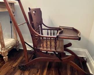 M63 - $50. Antique High Chair / Stroller Combo. Measures 17.5" wide x 21" deep as highchair (x 36" deep as a stroller ) x 39.75" tall as a highchair (32" tall as a stroller) 