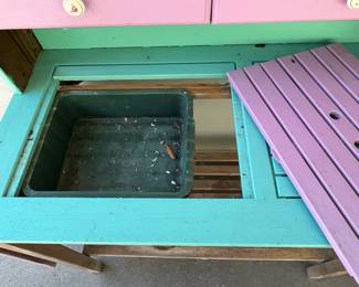 M77 - $75. Teak Potting Bench. Metal hinges do have rust. Has been used / store in a covered screened in porch. Measures 42" wide x 23" deep x 57" tall. Leaf adds 19.5". Does wiggle a bit and could use some tightening up. 