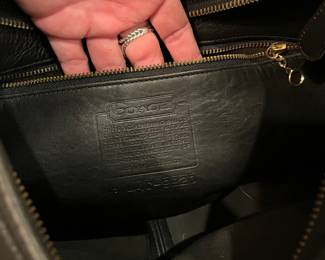 M113 - $85. Vintage Coach Mini Zipper Shoulder Bag. Measures 11.5" x 4" x 10". 
