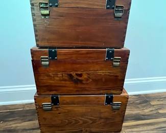 M80 - $30. Decorative Wooden Crates. Leather straps have all been torn off but the boxes themselves are in good condition. All open and can be used for display or storage. Largest is 17" x 9" x 10" tall. 