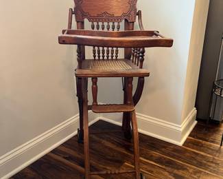 M63 - $50. Antique High Chair / Stroller Combo. Measures 17.5" wide x 21" deep as highchair (x 36" deep as a stroller ) x 39.75" tall as a highchair (32" tall as a stroller) 