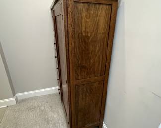 M62 - $225. Antique Oak Chifferobe. Measures 40" wide x 18" deep x 61" tall. Long door has been repaired on the bottom right corner. All drawers slide easily as they should!