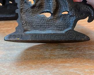 M13 - $25. PAIR Galleon Bookends. Cast Iron. Measures 5" wide x 4.5" tall. 