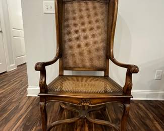 M102 - $125. Single Wingback Armchair. Caning is in good condition - but vintage! Measures 26.5" x 16.5" floor to seat x 50.5" tall. 
