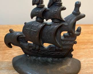 M13 - $25. PAIR Galleon Bookends. Cast Iron. Measures 5" wide x 4.5" tall. 