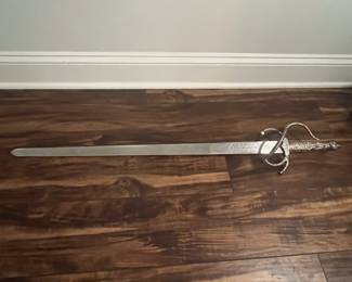 M68 - $60. Decorative Sword. Stamped "Toledo". Measures 41" long. 