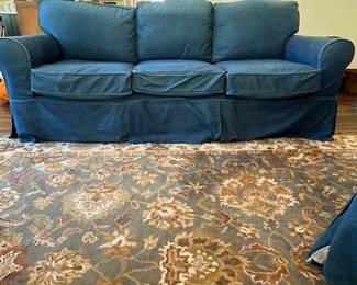 M73 - $600. Craftmaster Couch with Denim Slipcover. Measures 88" wide x 37" deep x 31" tall. 