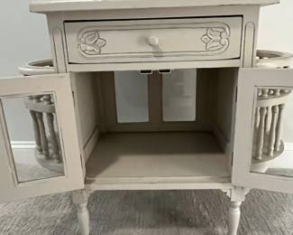 M42 - $75. Storage Cabinet with removable serving tray. Measures 37" wide x 18" deep x 31" tall. Sturdy and very pretty. 