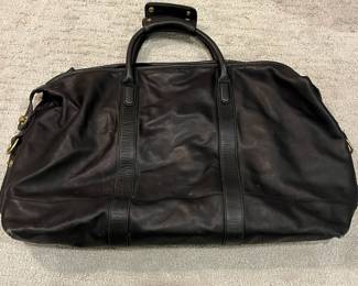 M115 - $140. Vintage COACH Black Leather Duffle Back. Measures 22" x 9" x 18". 