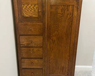 M62 - $225. Antique Oak Chifferobe. Measures 40" wide x 18" deep x 61" tall. Long door has been repaired on the bottom right corner. All drawers slide easily as they should!