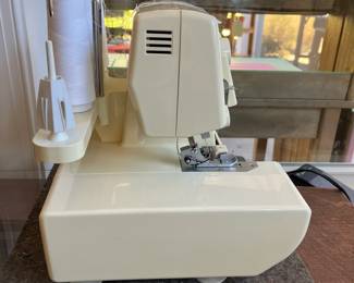 M89 - $150. Pfaff Hobbylock 776 Serger. Has power cord and pedal. 
