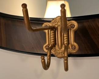 M40 - $40. Wall Mirror with Hooks. Measures 25.5" x 17.25" 