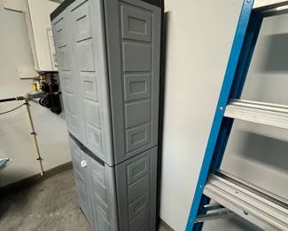 M135 - $40. Plastic Garage Storage Cabinet. Measures 27" x 16" x. 65" tall. 