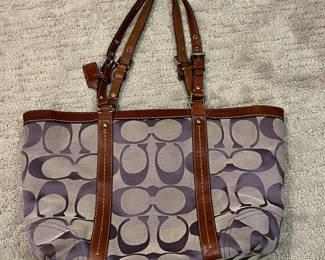 M114 - $35. Vintage Signature Coach Tote. Measures 16" x 3.25" x 10". 