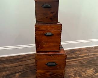 M80 - $30. Decorative Wooden Crates. Leather straps have all been torn off but the boxes themselves are in good condition. All open and can be used for display or storage. Largest is 17" x 9" x 10" tall. 