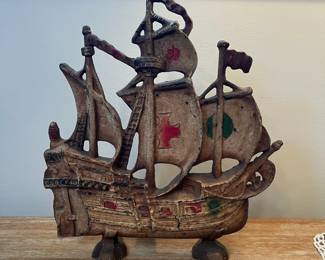 M12 - $35. Cast Iron Ship Door Stop. Measures 11" wide x 12" tall. 