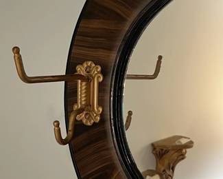 M40 - $40. Wall Mirror with Hooks. Measures 25.5" x 17.25" 