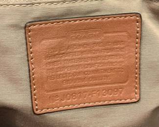 M114 - $35. Vintage Signature Coach Tote. Measures 16" x 3.25" x 10". 