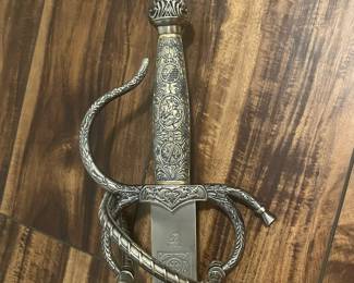 M68 - $60. Decorative Sword. Stamped "Toledo". Measures 41" long. 