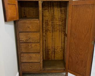 M62 - $225. Antique Oak Chifferobe. Measures 40" wide x 18" deep x 61" tall. Long door has been repaired on the bottom right corner. All drawers slide easily as they should!