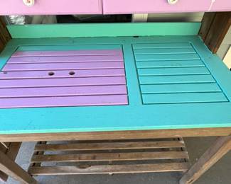 M77 - $75. Teak Potting Bench. Metal hinges do have rust. Has been used / store in a covered screened in porch. Measures 42" wide x 23" deep x 57" tall. Leaf adds 19.5". Does wiggle a bit and could use some tightening up. 