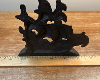 M13 - $25. PAIR Galleon Bookends. Cast Iron. Measures 5" wide x 4.5" tall. 