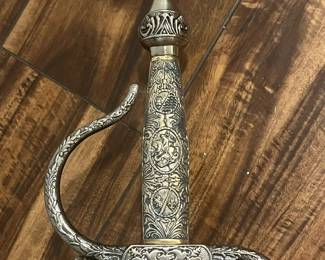 M68 - $60. Decorative Sword. Stamped "Toledo". Measures 41" long. 