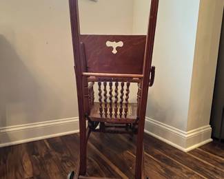 M63 - $50. Antique High Chair / Stroller Combo. Measures 17.5" wide x 21" deep as highchair (x 36" deep as a stroller ) x 39.75" tall as a highchair (32" tall as a stroller) 