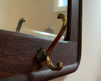 M53 - $85. Antique Framed Mirror with hooks. Measures 48" x 18" x 30" tall. Beautiful antique frame with original mirror. 