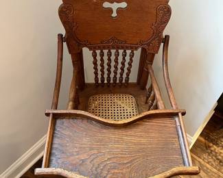 M63 - $50. Antique High Chair / Stroller Combo. Measures 17.5" wide x 21" deep as highchair (x 36" deep as a stroller ) x 39.75" tall as a highchair (32" tall as a stroller) 