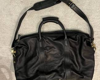 M115 - $140. Vintage COACH Black Leather Duffle Back. Measures 22" x 9" x 18". 