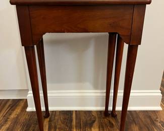 M106 - $25. Small Side Table. Measures 20" x 10" deep x 28.5" tall. (Intended to be a flip top table but it seems the 2 pieces have been glued together. Will NOT open larger. 