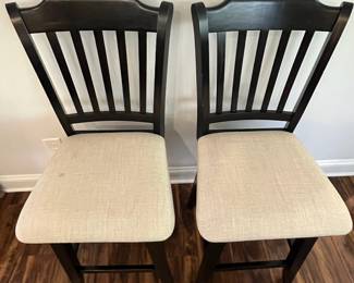 M88 - $160. Set of 4 Counter Height Stools. Measures 19" wide x 25" floor to seat x 42.5" to seat back.  They do "swivel" but its more just to get off not to swing back and forth. 