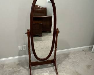 M28 - $40. Adjustable Wooden Floor Mirror. Measures 25" wide x 21" deep x 59.5" tall. 