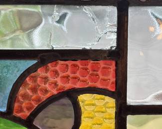 M3 - $75. Stained Glass with hooks to hang in the window. Measures 20" x 15". Has crack & hole in top center clear panel. 