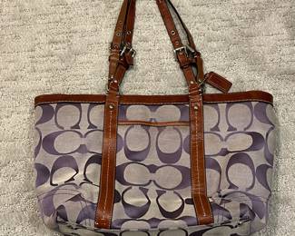 M114 - $35. Vintage Signature Coach Tote. Measures 16" x 3.25" x 10". 