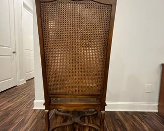M102 - $125. Single Wingback Armchair. Caning is in good condition - but vintage! Measures 26.5" x 16.5" floor to seat x 50.5" tall. 