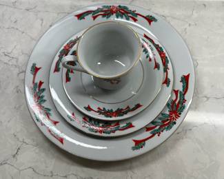 M94 - $30. Poinsettia Ribbons China. 8 Dinner plates. 8 Salad Plates. 7 cups & saucers. 