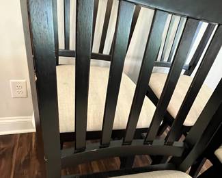 M88 - $160. Set of 4 Counter Height Stools. Measures 19" wide x 25" floor to seat x 42.5" to seat back.  They do "swivel" but its more just to get off not to swing back and forth. 