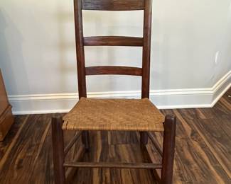 M85 - $40. Small Rocker with woven seat. 
