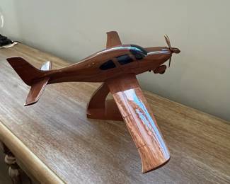 M92 - $40. Cirrus 22 Model Airplane Carving. (Nose has been repaired but you have to really look to see it.) Measures 22" wide x 14.5" deep x 8" tall. 